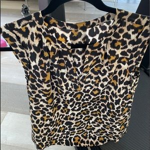 Silk short sleeve top in pristine condition. Only worn once